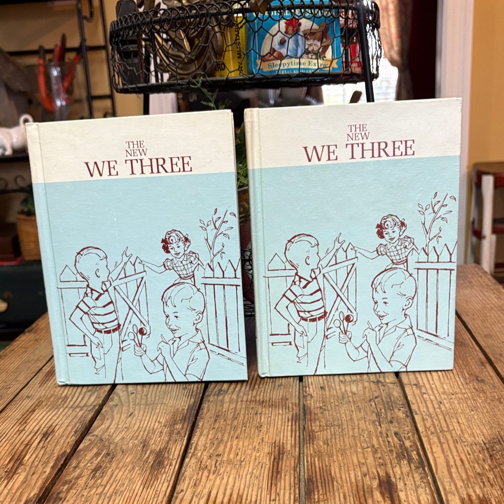 Vintage school readers titled "The New We Three" circa 1963
